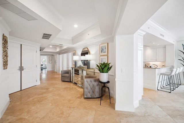 living room with recessed lighting, visible vents, and crown molding