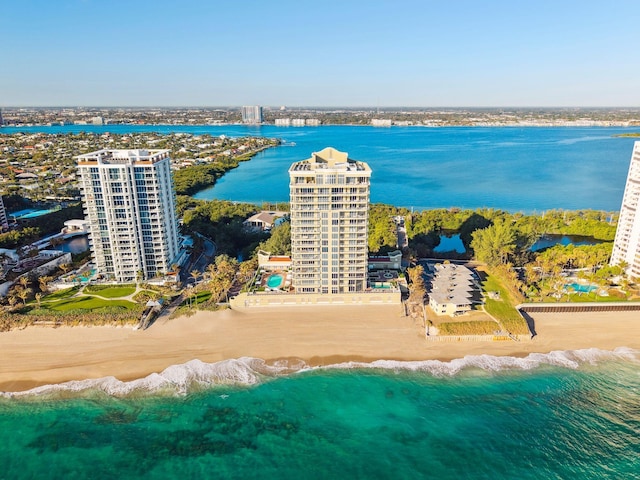 aerial view featuring a water view and a beach view