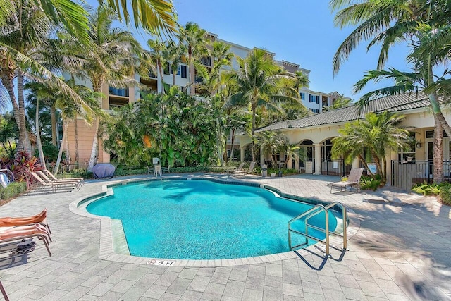 view of swimming pool with a patio area