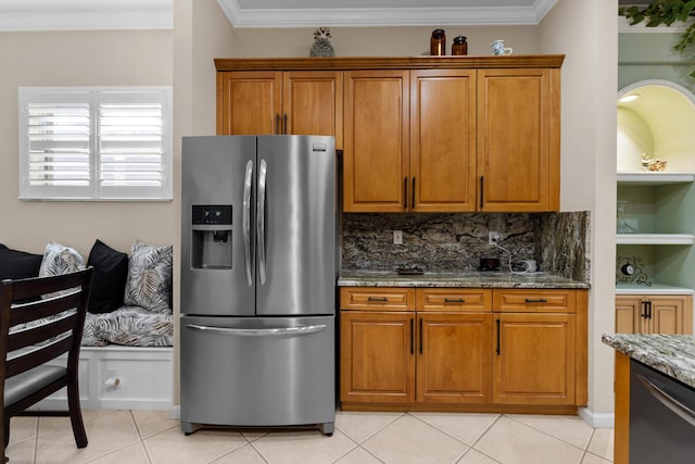 kitchen featuring stone counters, tasteful backsplash, crown molding, and stainless steel fridge with ice dispenser