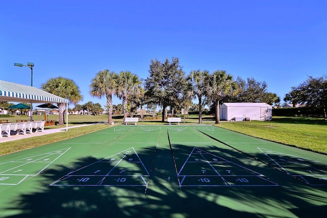 view of home's community featuring a yard