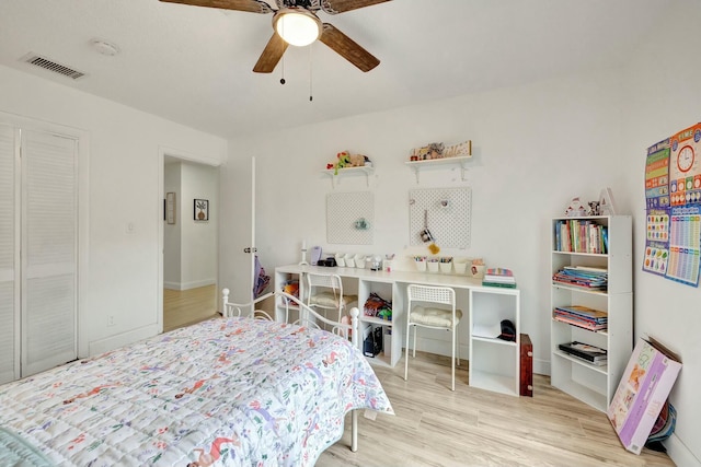 bedroom with ceiling fan and light wood-type flooring