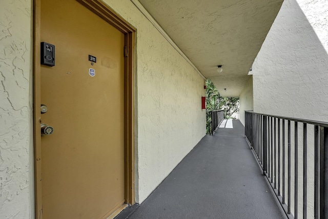 property entrance with a balcony