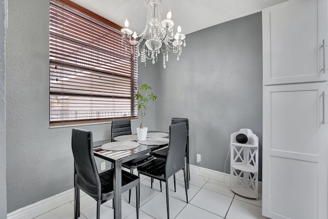 dining space featuring light tile patterned flooring and a notable chandelier