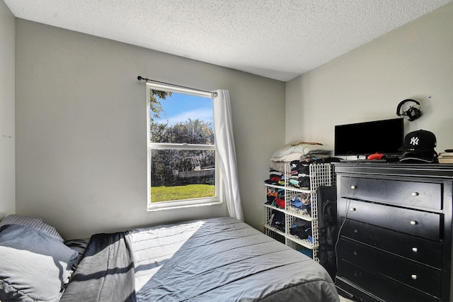 bedroom featuring a textured ceiling