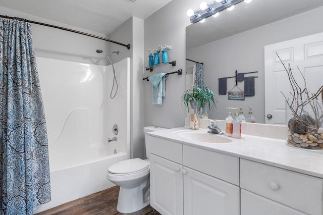 full bathroom with shower / bath combination with curtain, vanity, toilet, and wood-type flooring