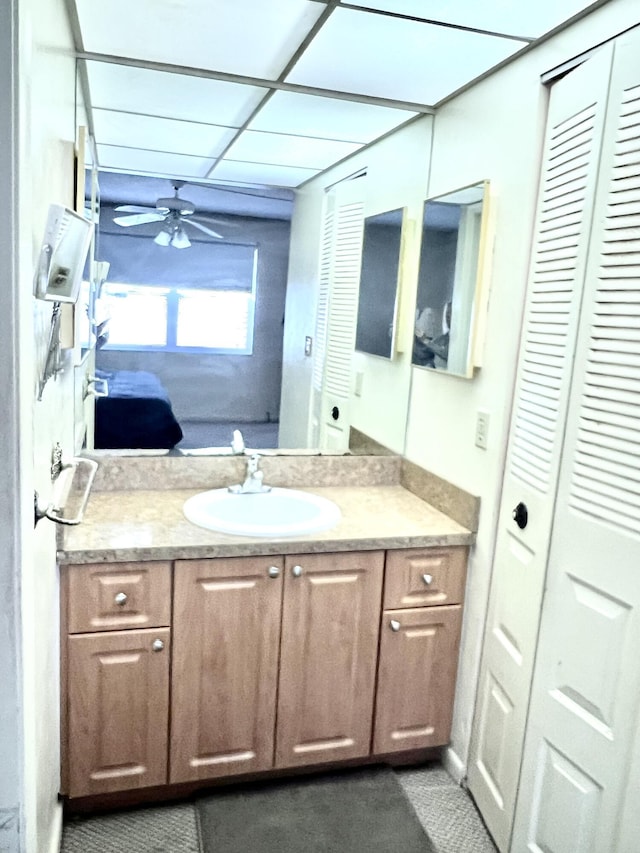 bathroom featuring vanity and ceiling fan