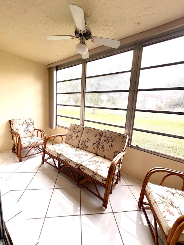 sunroom / solarium with ceiling fan