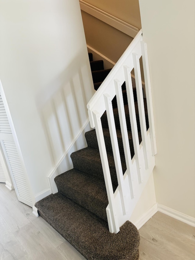 9189 Boca Gardens Cir Unit D, Boca Raton, FL 33496 - stairs with wood finished floors and baseboards