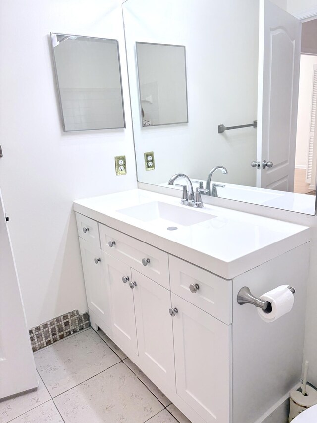 9189 Boca Gardens Cir Unit D, Boca Raton, FL 33496 - bathroom featuring vanity and tile patterned floors