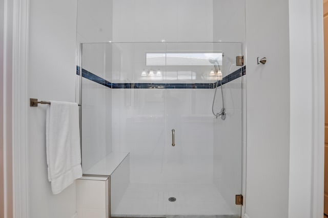 bathroom featuring an enclosed shower