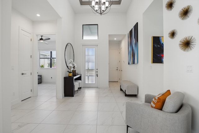 entrance foyer featuring a notable chandelier