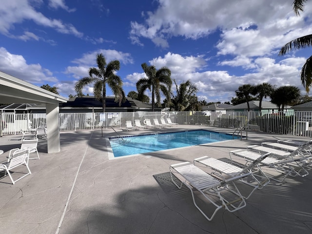 view of swimming pool featuring a patio area