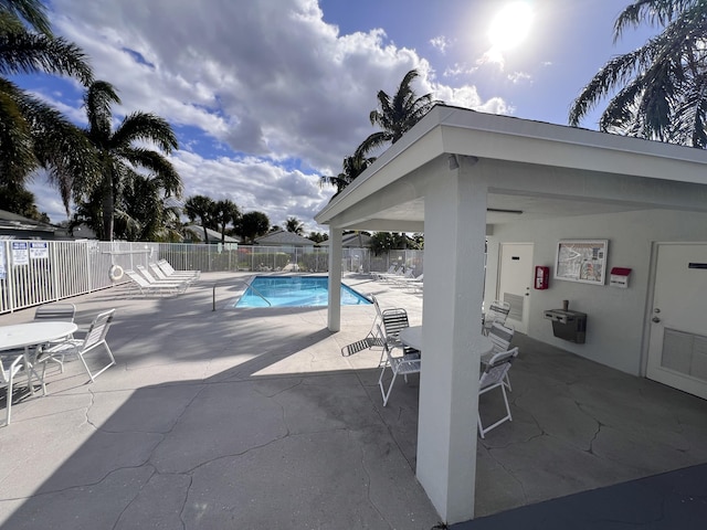 view of swimming pool with a patio area