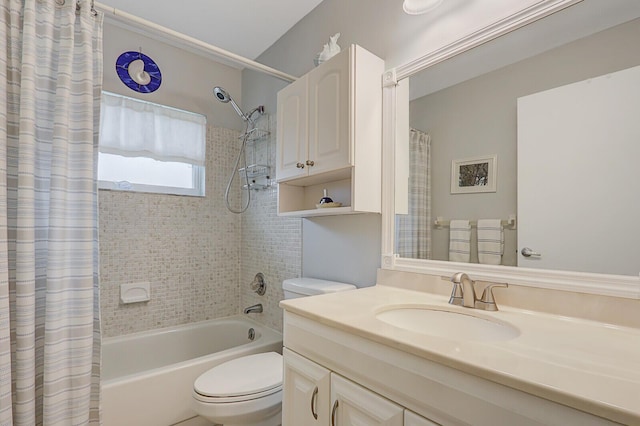 full bathroom featuring vanity, toilet, and shower / tub combo