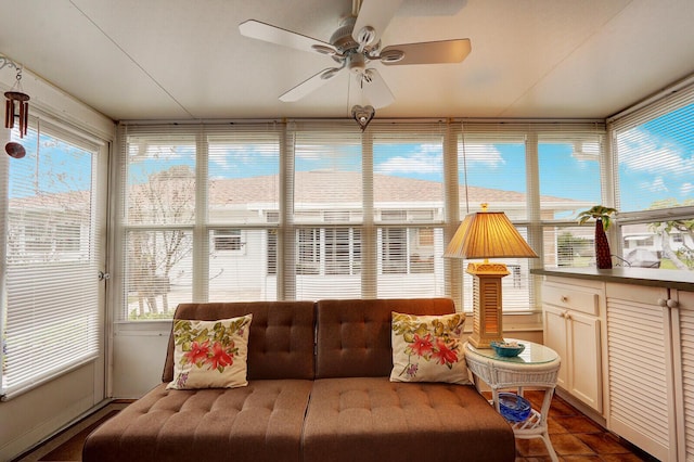 sunroom / solarium with ceiling fan and a wealth of natural light