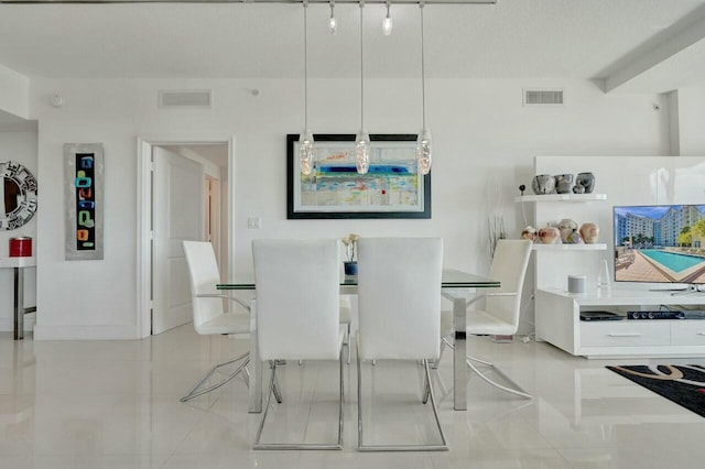 view of tiled dining room