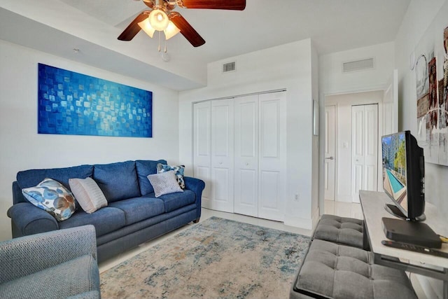 living room featuring ceiling fan