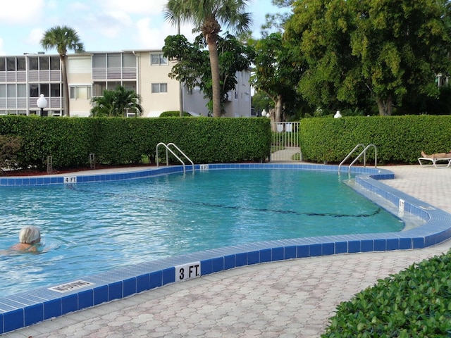 pool featuring fence