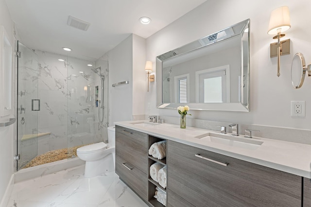 bathroom with walk in shower, vanity, and toilet