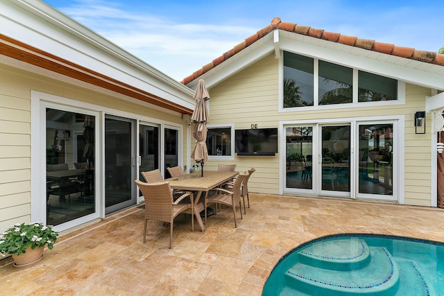 rear view of house with a patio area