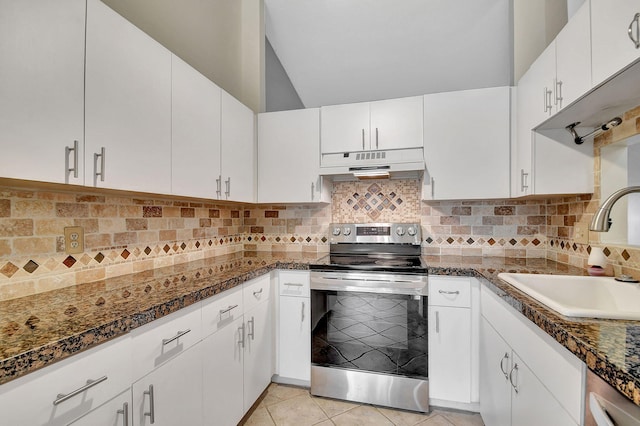 kitchen featuring white cabinetry, sink, dark stone countertops, and appliances with stainless steel finishes