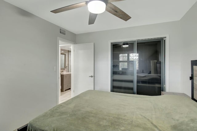 unfurnished bedroom with ceiling fan and a closet