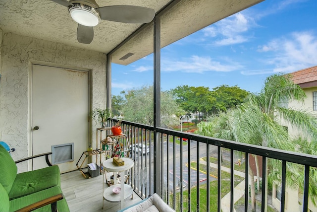 balcony featuring ceiling fan