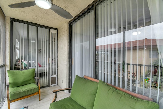 balcony featuring ceiling fan