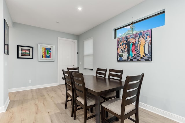 dining room with light hardwood / wood-style floors