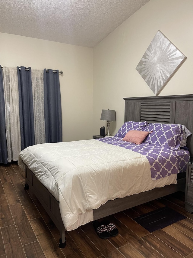 bedroom featuring a textured ceiling