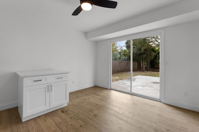 interior space featuring ceiling fan and light hardwood / wood-style flooring