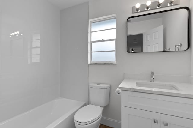 full bathroom featuring vanity, tub / shower combination, and toilet