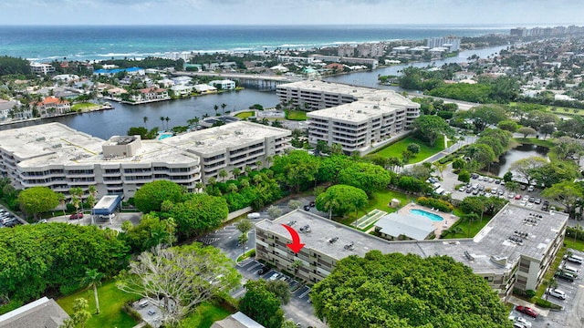 aerial view with a water view and a city view