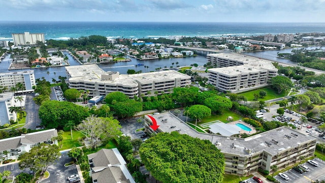 bird's eye view with a water view and a view of city