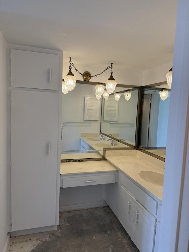 bathroom with vanity and unfinished concrete floors