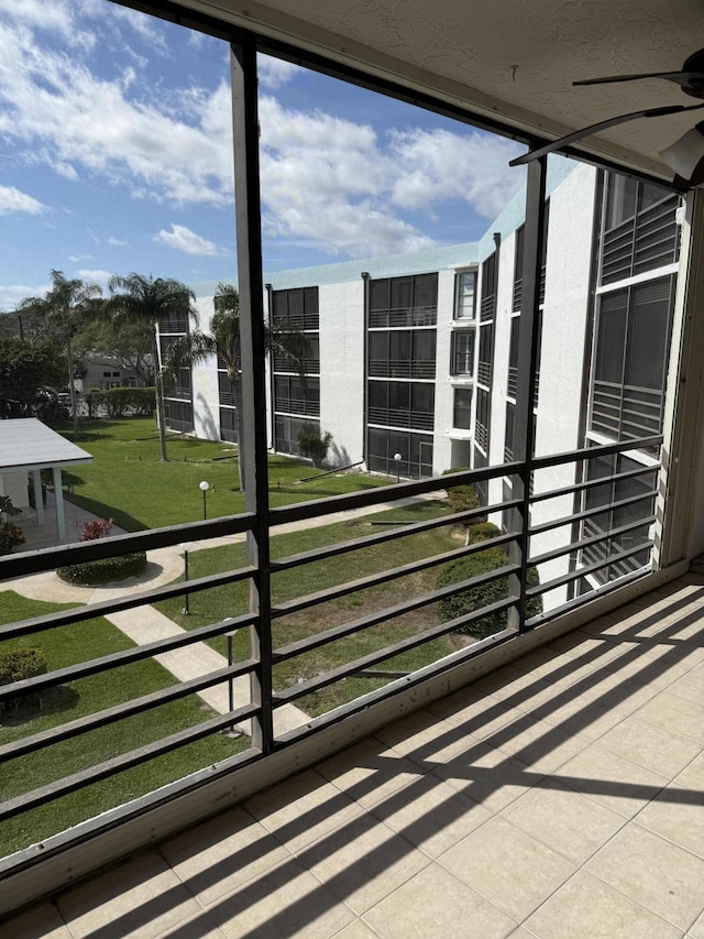 balcony featuring a sunroom