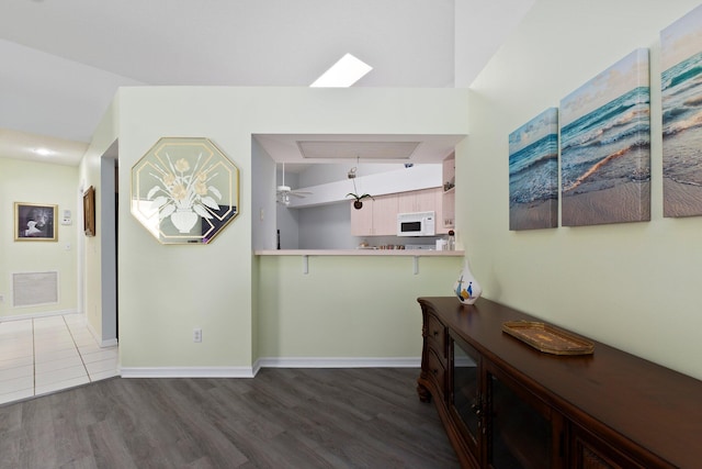 interior space with dark hardwood / wood-style flooring