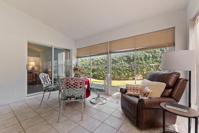 sunroom with vaulted ceiling and a wealth of natural light