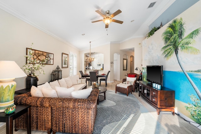 living room featuring ceiling fan with notable chandelier, ornamental molding, and light hardwood / wood-style floors