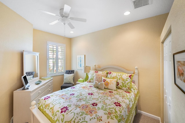 carpeted bedroom featuring ceiling fan