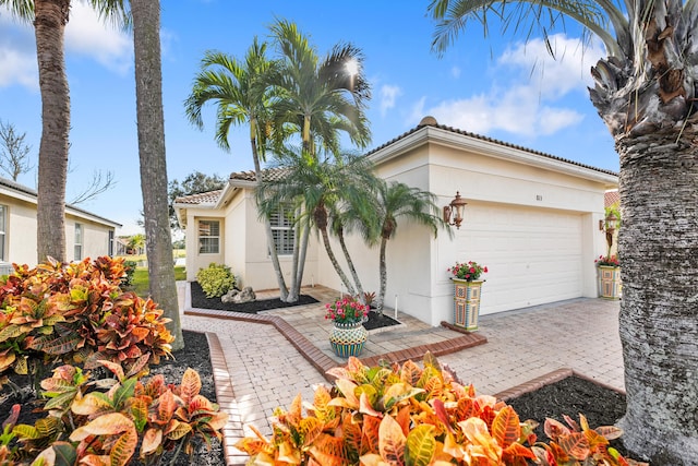 view of front of property featuring a garage