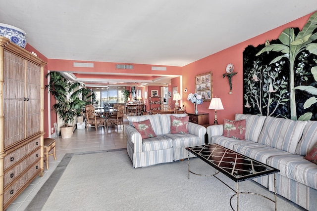 living room with tile patterned flooring