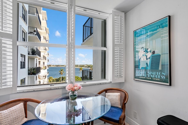 dining room with a water view