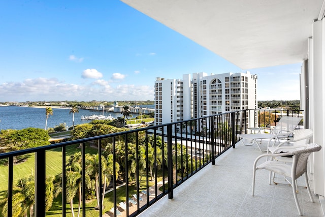 balcony featuring a water view