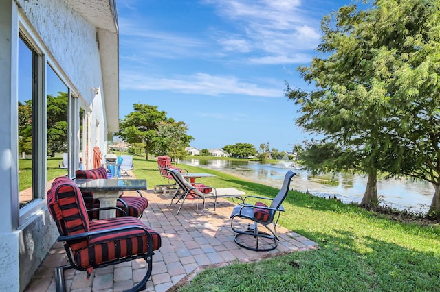 view of patio / terrace featuring a water view