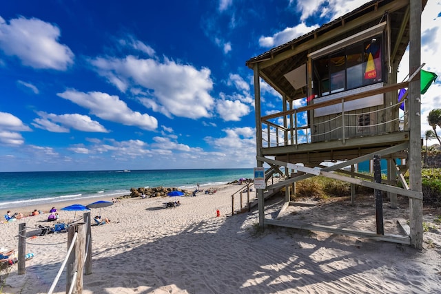 property view of water featuring a view of the beach