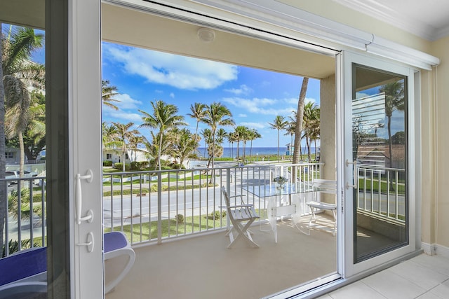 balcony featuring a water view