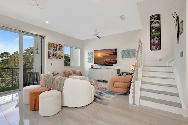 living room featuring ceiling fan