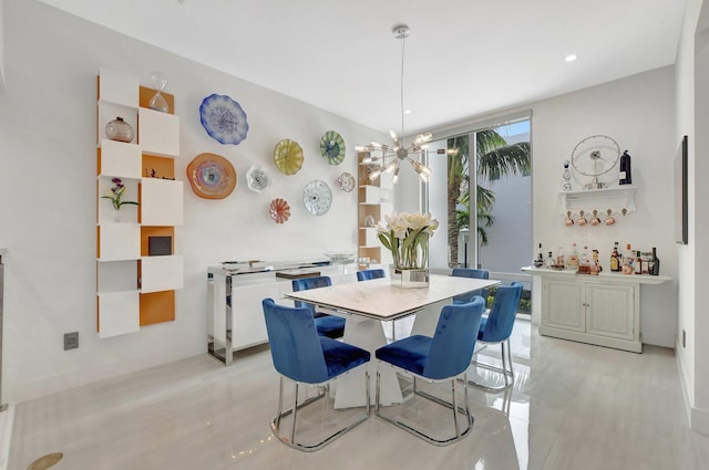 dining area with a notable chandelier